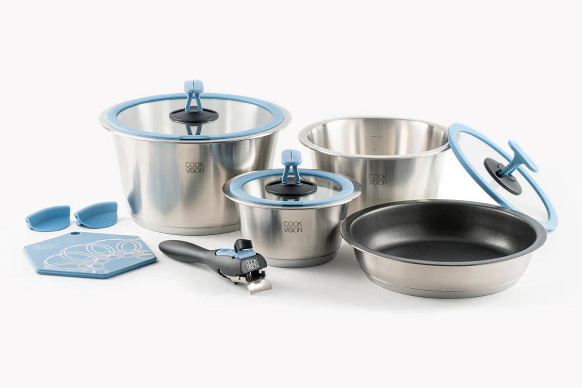 Set of stainless steel cookware with blue lids on a white background